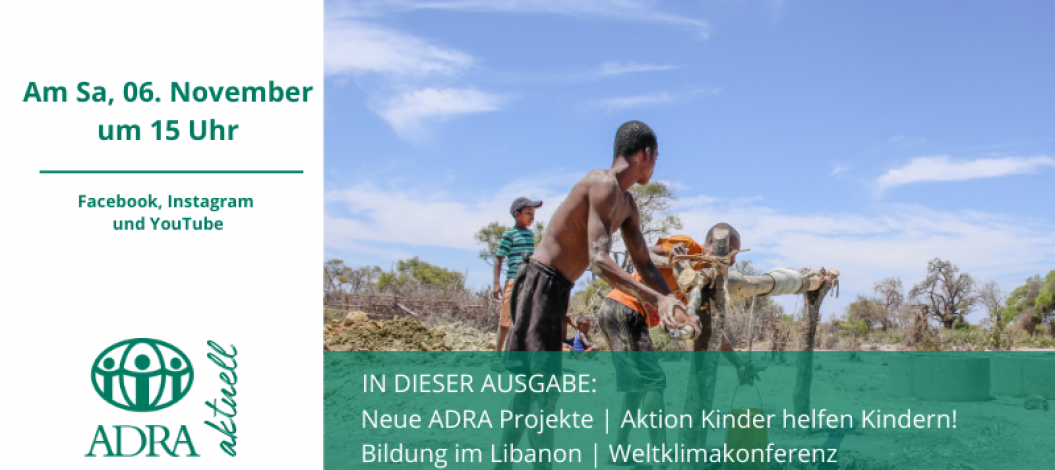 Männer arbeiten an einer Wasserpumpe.